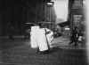 Hine.hats.boy.carrying.photo.jpg (65649 bytes)